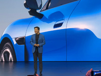 小米新一代SU7 34分钟锁单超1.5万台，雷军公布600亿投资计划